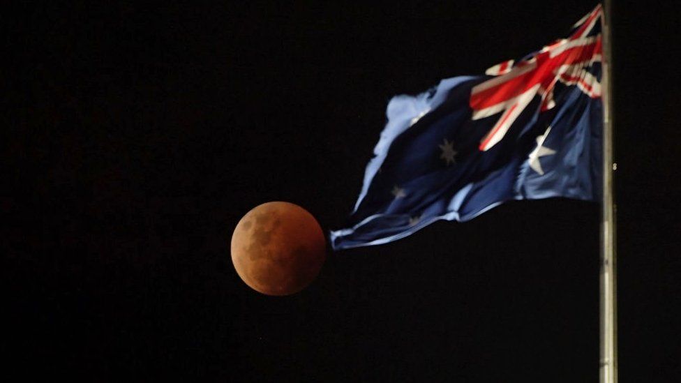 Moon against Australian flag