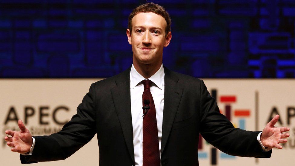 Mark Zuckerberg gestures while addressing the audience during a meeting of the APEC (Asia-Pacific Economic Cooperation) CEO Summit in Lima, Peru, November 19, 2016.