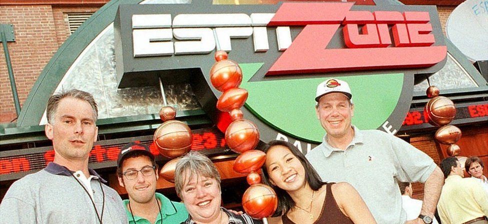 ESPN Sports centre anchor Kenny Mayne, actor Adam Sandler, actress Kathy Bates and Olympian Michelle Kwan with Walt Disney boss Michael Eisner in 1998