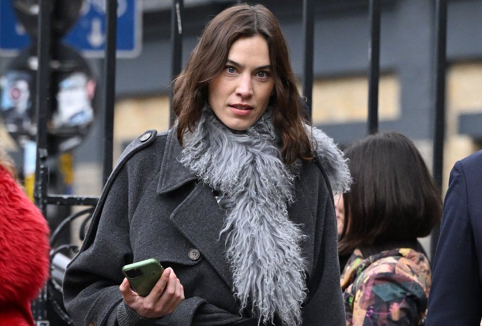 Alexa Chung arrives for a memorial service to honour and celebrate the life of fashion designer Dame Vivienne Westwood at Southwark Cathedral, London,