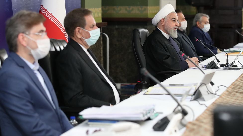Iranian officials, including President Hassan Rouhani, meet to discuss the coronavirus pandemic