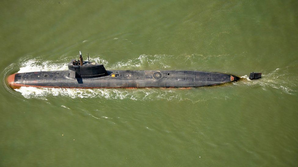 This file handout photo taken and released by The Indian Navy on May 1, 2016 shows India"s Scorpene Class Submarine INS Kalvari taking part in its maiden sea trials off the coast of Mumba