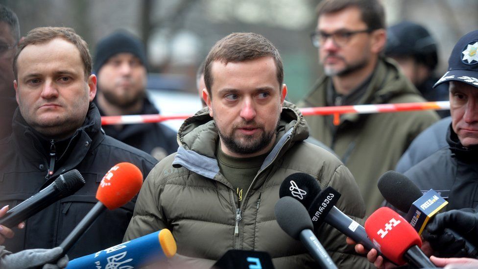 Kyrylo Tymoshenko surrounded by reporters at scene of helicopter crash in Kyiv