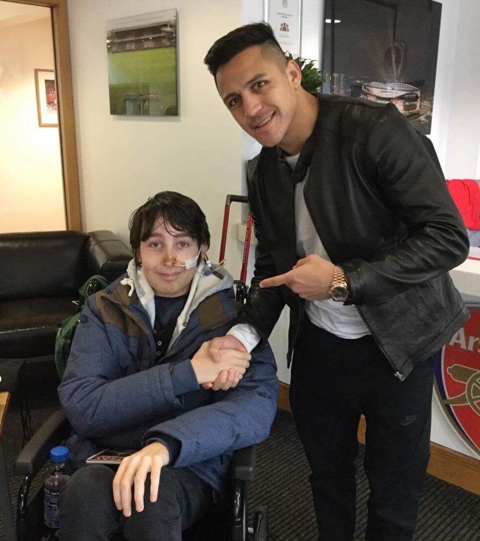 Jack, pictured with footballer Alexis Sanchez.