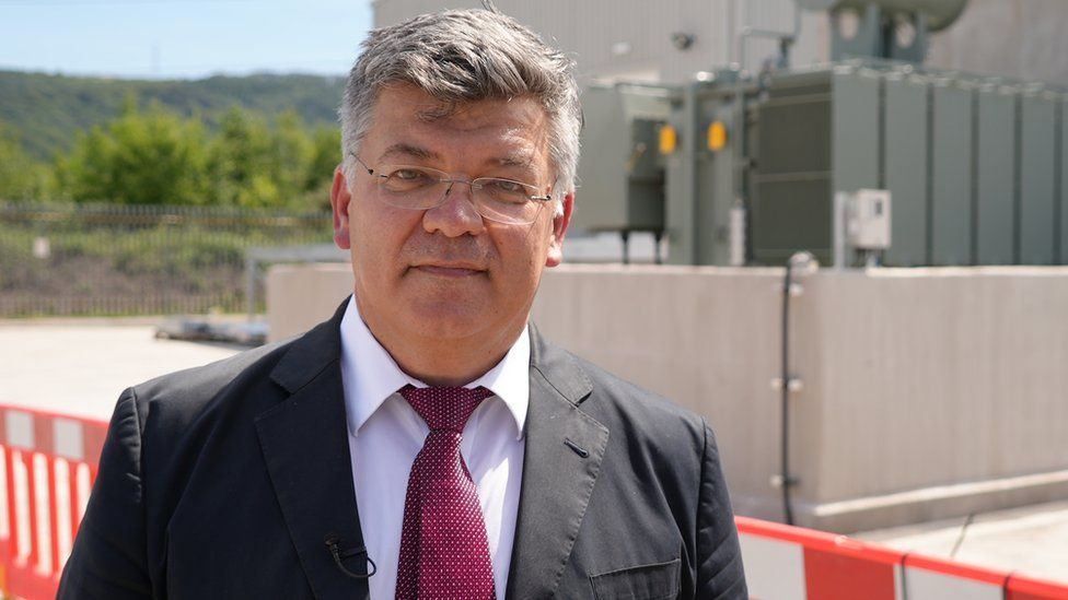Giuseppe Munari, manager of Sofidel tissue manufacturer in Baglan, pictured by the plant's new electricity substation which connects it to the national grid