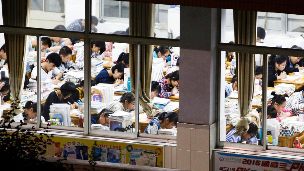 Senior high school students studying at night to prepare for the college entrance exams