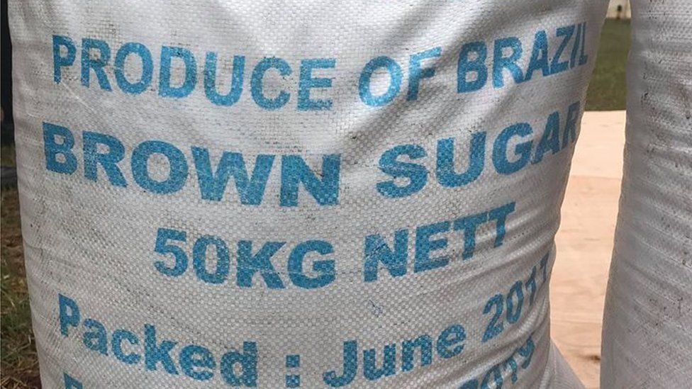 Bag of sugar labelled "Brown Sugar, Produce of Brazil"