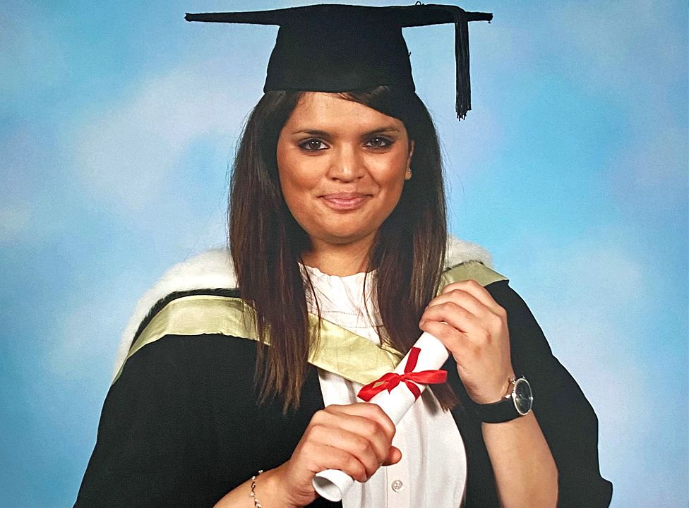 Fawziyah Javed posing in a graduation portrait