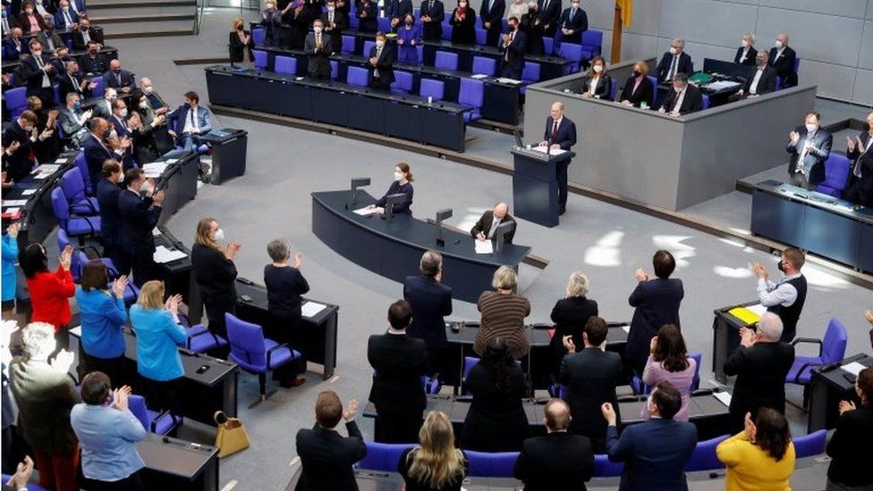 German Chancellor Olaf Scholz receives a standing ovation while addressing an extraordinary session, after Russia launched a massive military operation against Ukraine, at the lower house of parliament Bundestag in Berlin, Germany, February 27, 2022.