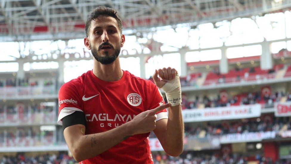 Antalyaspor's Israeli player Sagiv Jehezkel shows his bandage which has "100 days, 7.10" written on it, referring to the attack by Hamas on October 7, 2023