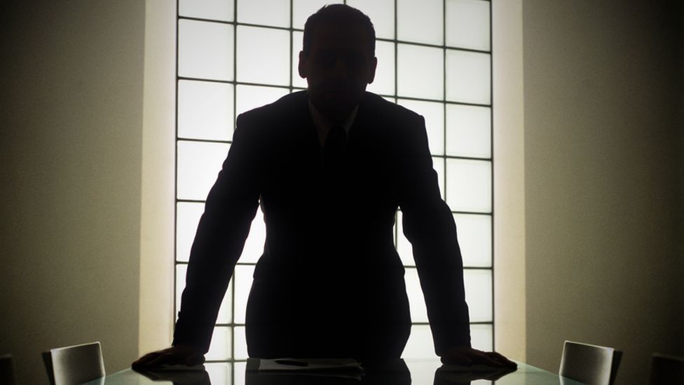 Businessman in shadow