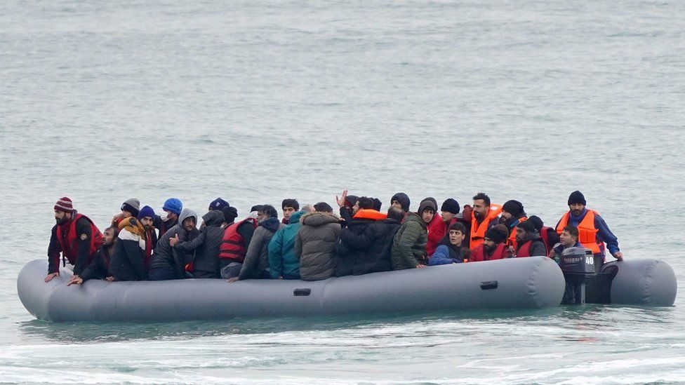 Migrants adrift in a dinghy off the coast of Folkestone, Kent on Saturday 20