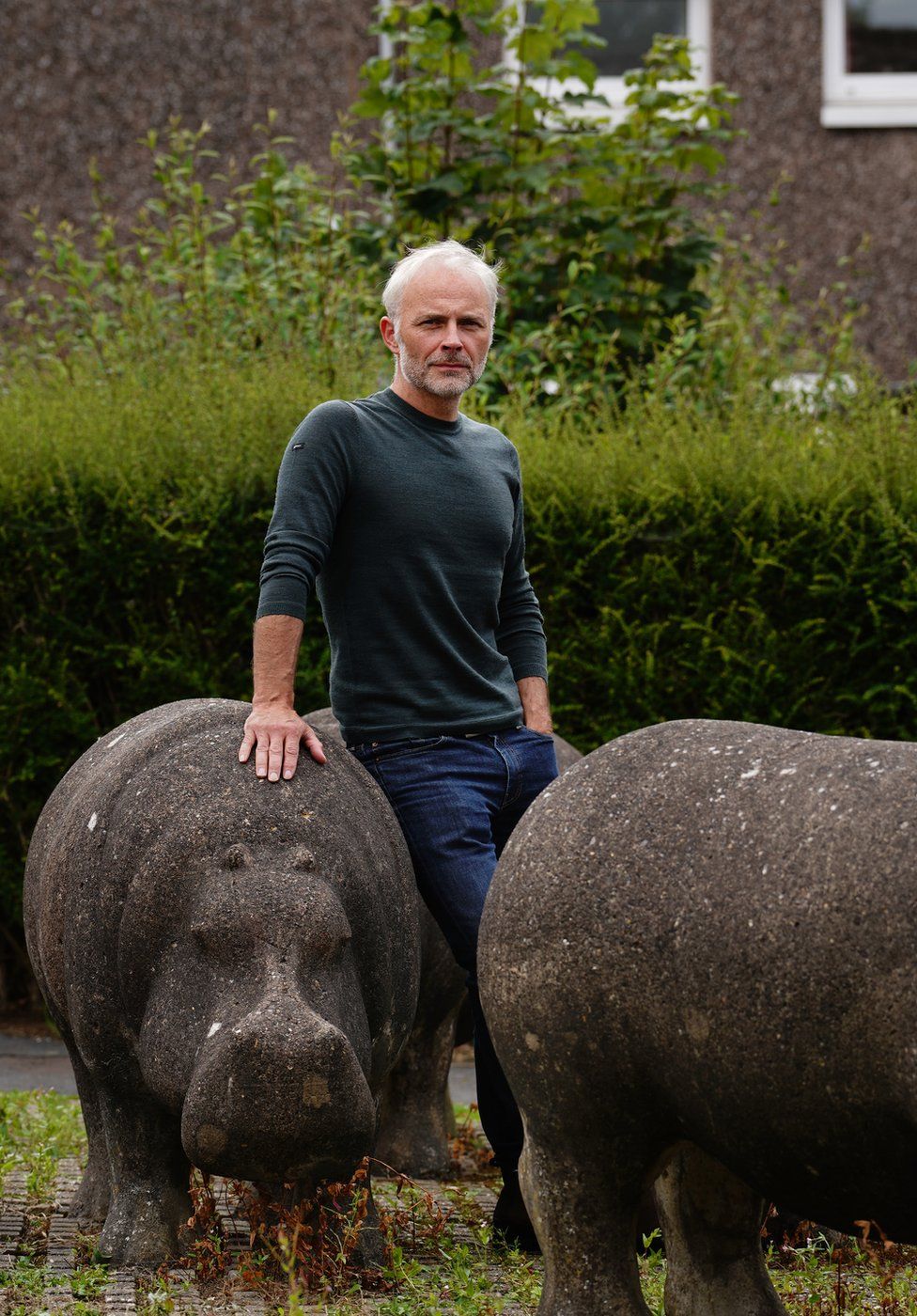 Mark Bonnar in Glenrothes with one of the concrete hippos made by his father Stan in the 70s Mark Bonnar in Glenrothes with one of the concrete hippos made by his father Stan in the 70s.