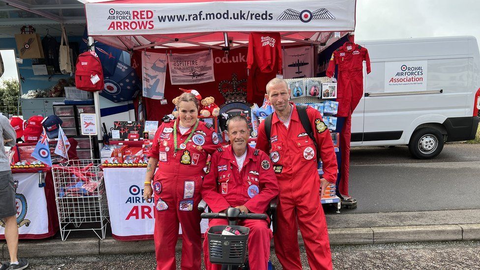 People in Red Arrows outfit