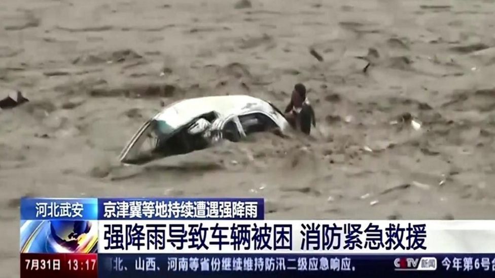 Beijings Unexpected Deluge The Storm Thats Shutting Down The City - h179go1
