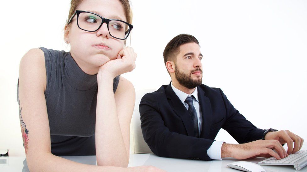 Woman bored in meeting