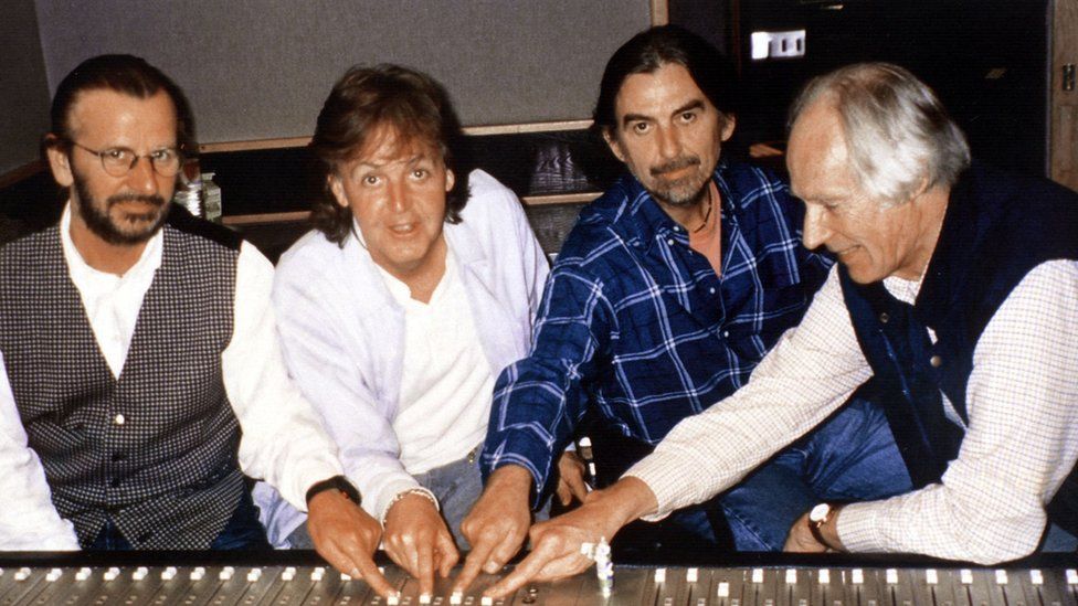 Ringo Starr, Sir Paul McCartney and George Harrison with Sir George Martin