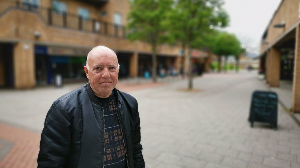 A pensioner stood in a Nottingham street