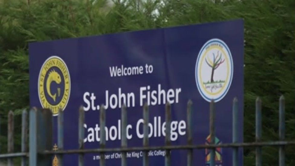 St John Fisher Catholic College sign, in Newcastle-under-Lyme