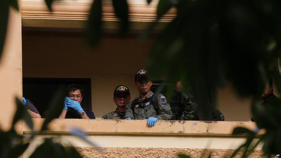 Thai police at the suspect's apartment in Bangkok on 29 August 2015