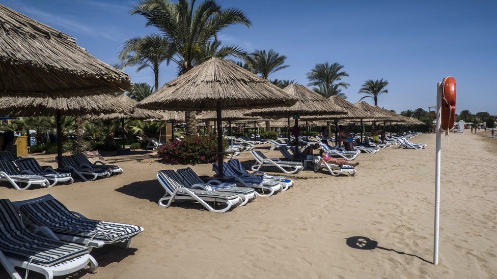 Empty sun loungers on a beach in the Sharm el-Sheikh resort