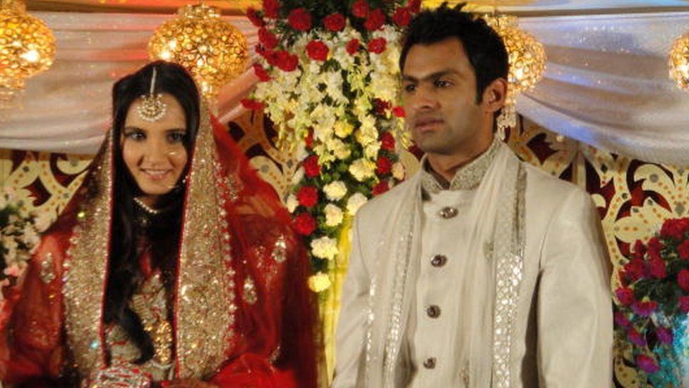 Sania Mirza with husband Shoaib Malik at her wedding reception in Hyderabad in April 2010