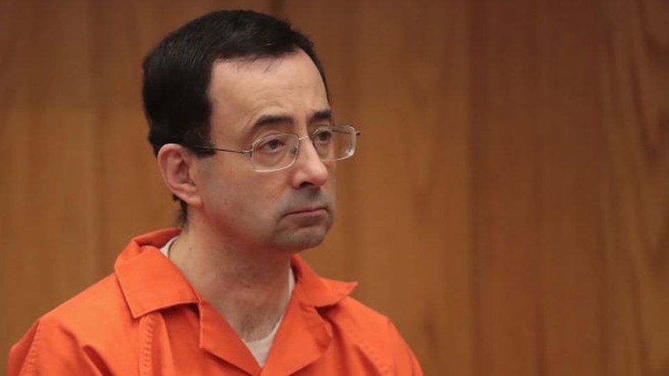 Larry Nassar sits in court listening to statements before being sentenced by Judge Janice Cunningham for three counts of criminal sexual assault in Eaton County Circuit Court on February 5, 2018 in Charlotte, Michigan