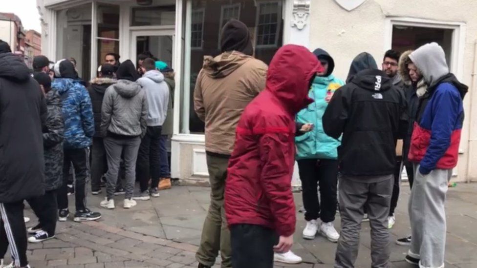 UK trainer fans camp outside store to buy Kanye West style
