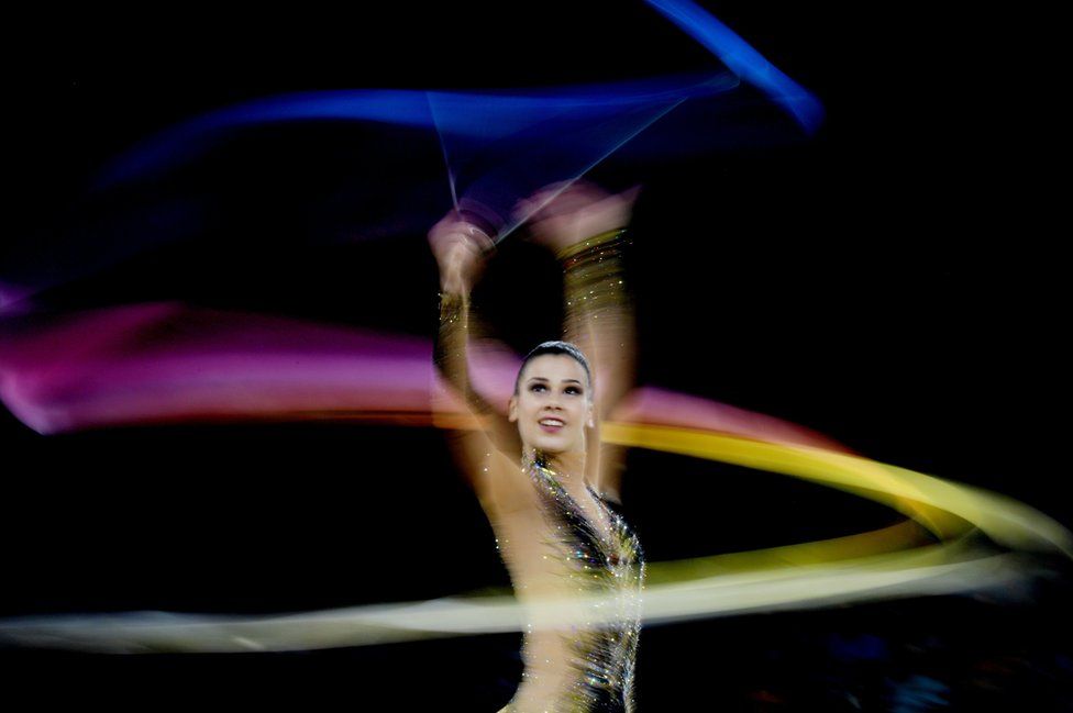 Diamanto Evripidou of Cyprus performs during the rhythmic gymnastics ribbon final of the XXI Commonwealth Games at the Gold Coast, Australia,