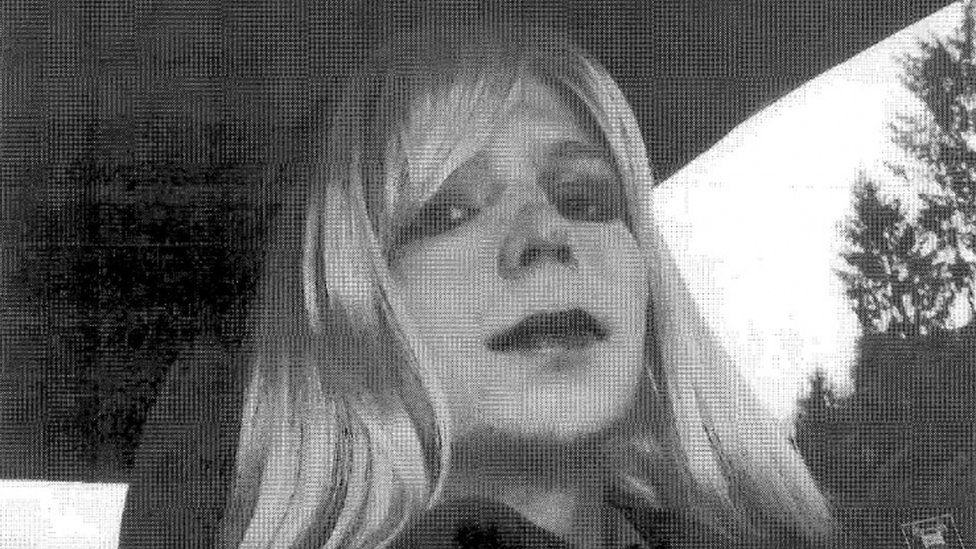 Bradley Manning, now known as Chelsea Manning, wears a wig while sitting in a car in undated photo.