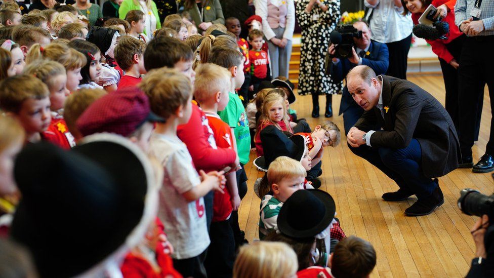 Prince William with pupils at Ysgol yr Holl Saint in Wrexham