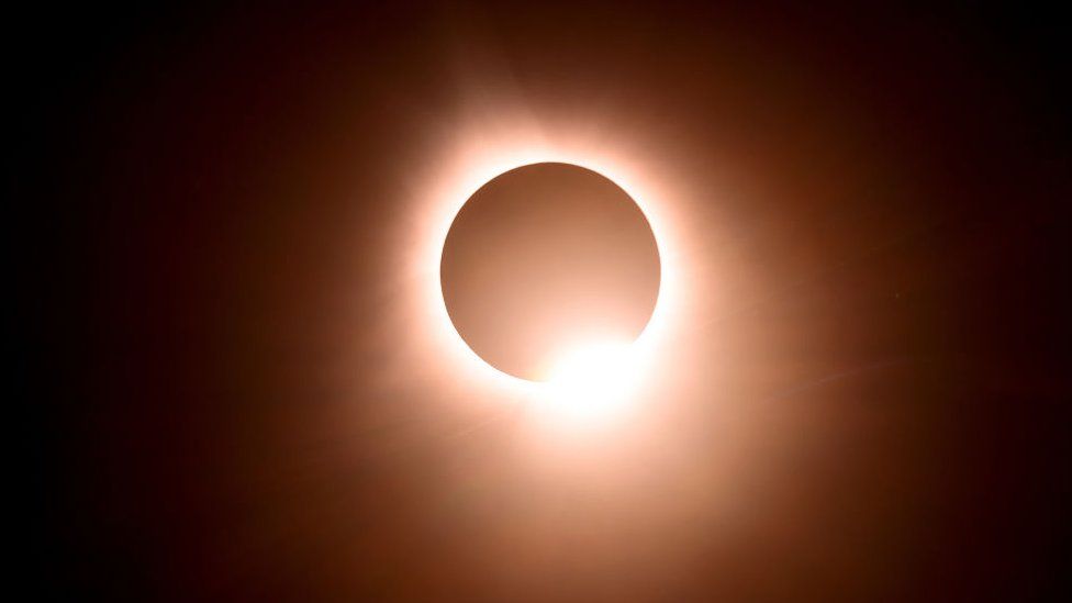 The moon eclipses the sun during a total solar eclipse across North America, in Bloomington, Indiana, on April 8, 2024.