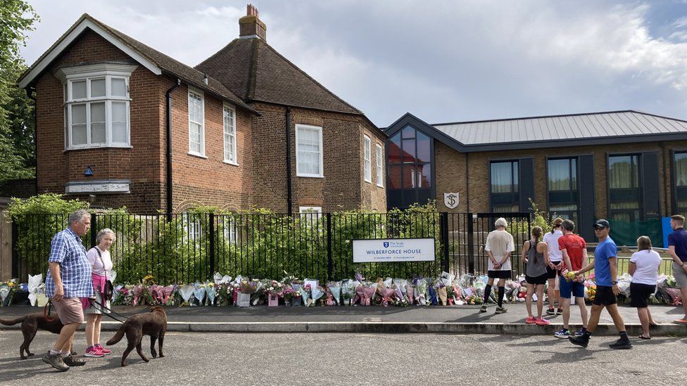 People come to pay their respects on Saturday at Wilberforce House