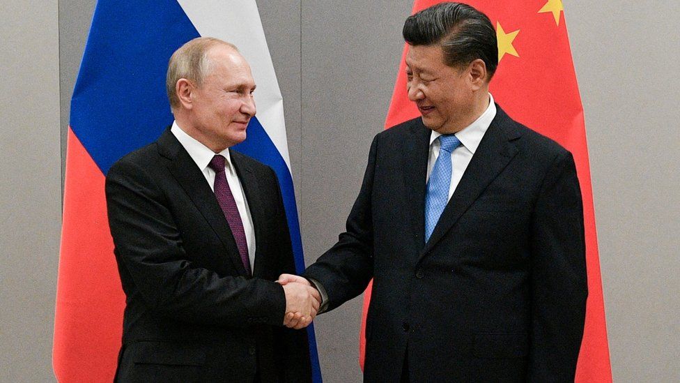 Russian President Putin meets with Chinese President Xi during their meeting on the sideline of the BRICS summit in Brasilia in November 2019