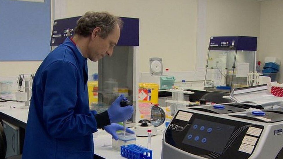Scientist working in lab