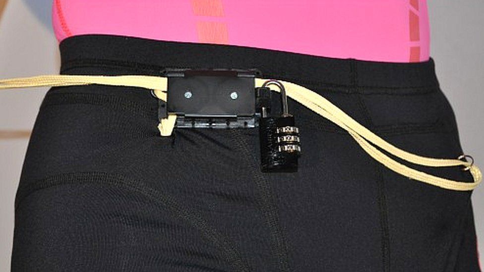 Close up of shorts with lock and alarm