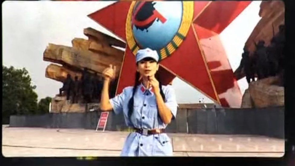 Bai Ling dressed in a red army uniform for her appearance in the documentary