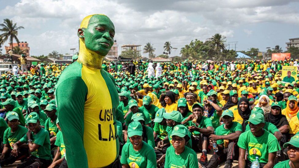 Supporters of the Tanzanian ruling party Chama Cha Mapinduzi (Revolutionary Party), gathered at the Kibanda Maiti Stadium, during the last campaign rally in Stone Town on October 25, 2020 ahead of the national elections.