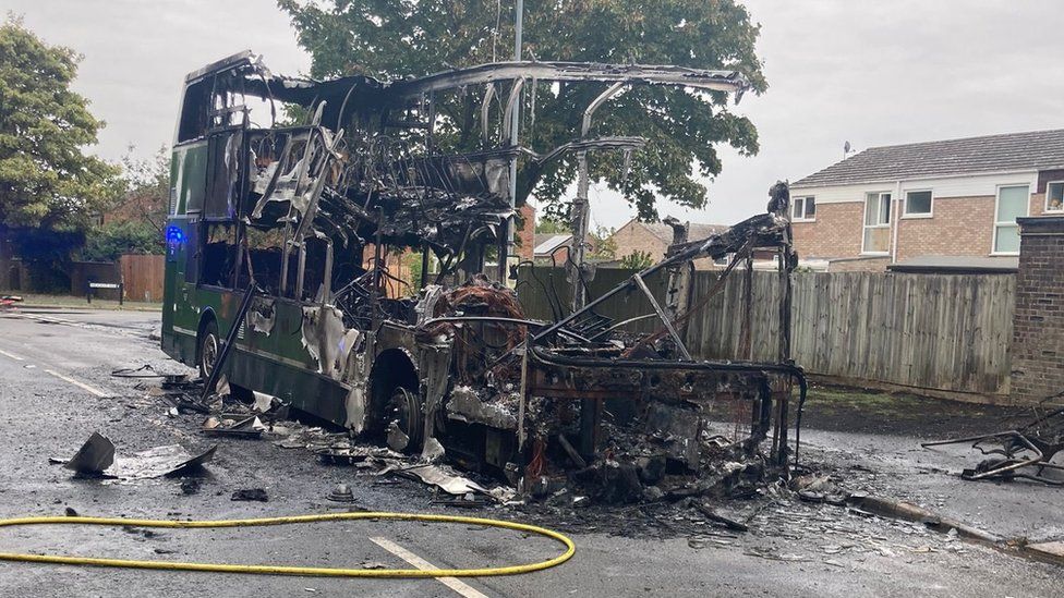 The burnt out bus after the flames were put out