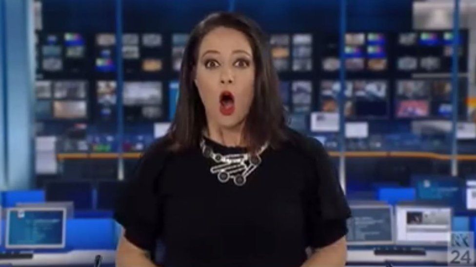 Natasha Exelby looks shocked immediately after realising she was live on air