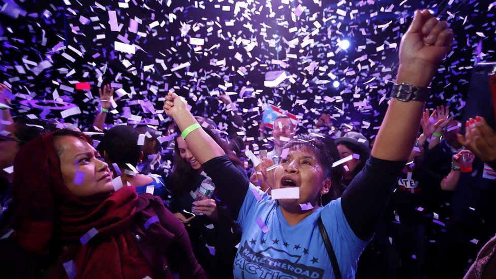 Supporters celebrate the victory of Alexandria Ocasio-Cortez at La Boom night club in Queens on November 6, 2018
