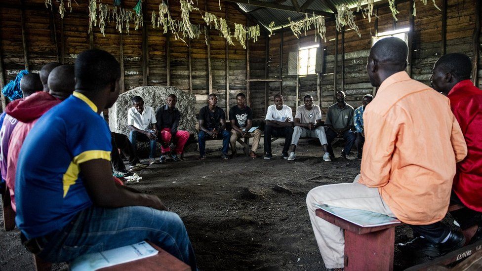 The Congo Men's Network holds a meeting with a group of local men