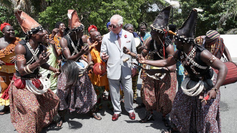 Prince Charles, Prince of Wales is greeted by traditional dancers during a tour of Christiansborg Castle on November 3, 2018