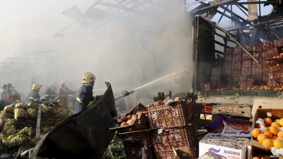 Firemen fight blaze at Sadr City market 13/08/2105