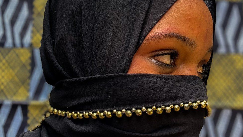 Fatou wearing a niqab