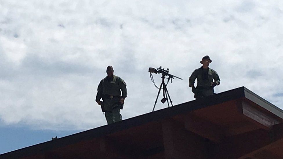 Snipers on the roof of a building in Charlottesville as march organiser Jason Kessler was prepared to speak