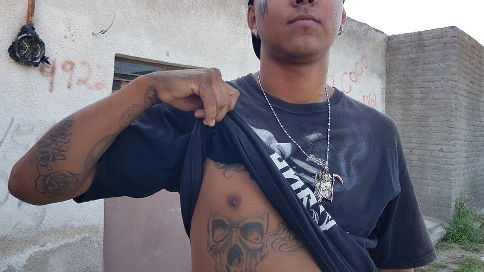 Mose Quintero shows off his Santa Muerte tattoo