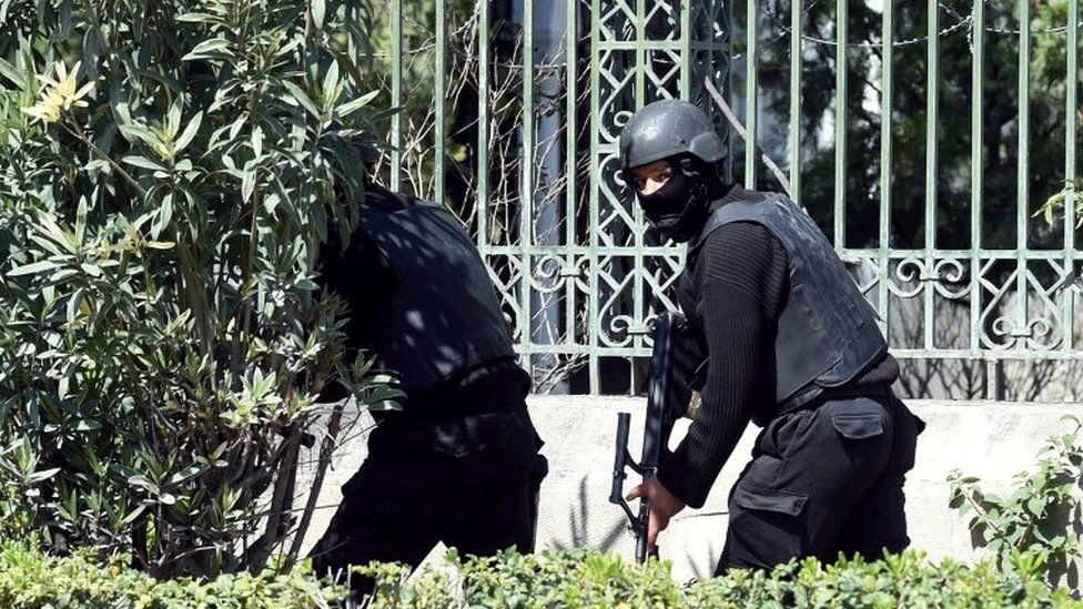 Tunisian security forces secure the area after gunmen attacked Tunis" famed Bardo Museum on March 18, 2015