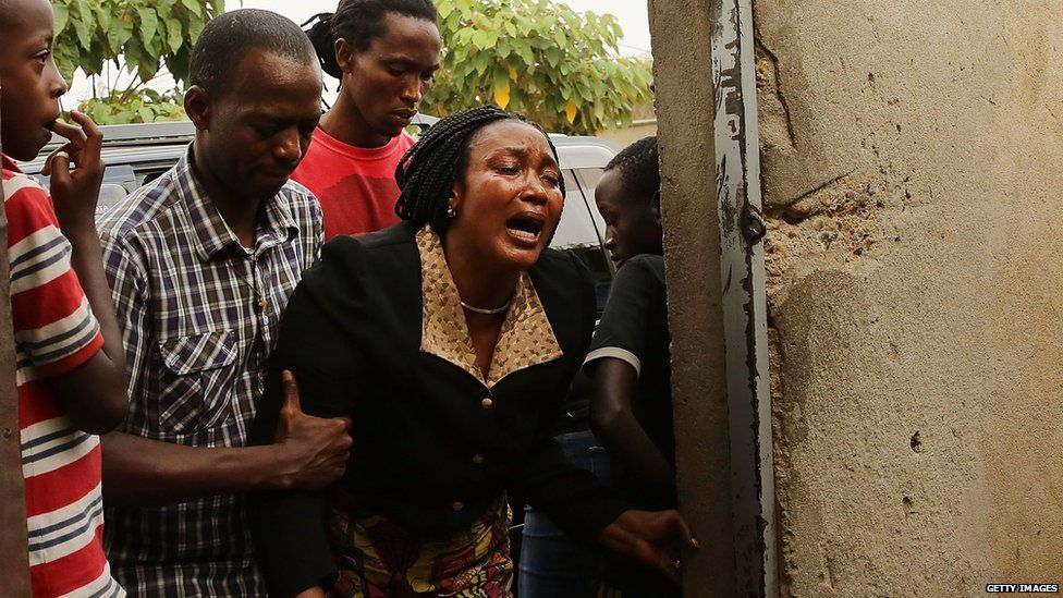 Woman mourns death of man killed in a police operation in Bujumbura