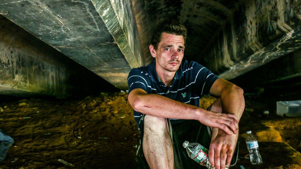 Addicts gather under the bridges along the freight track, away from the public eye